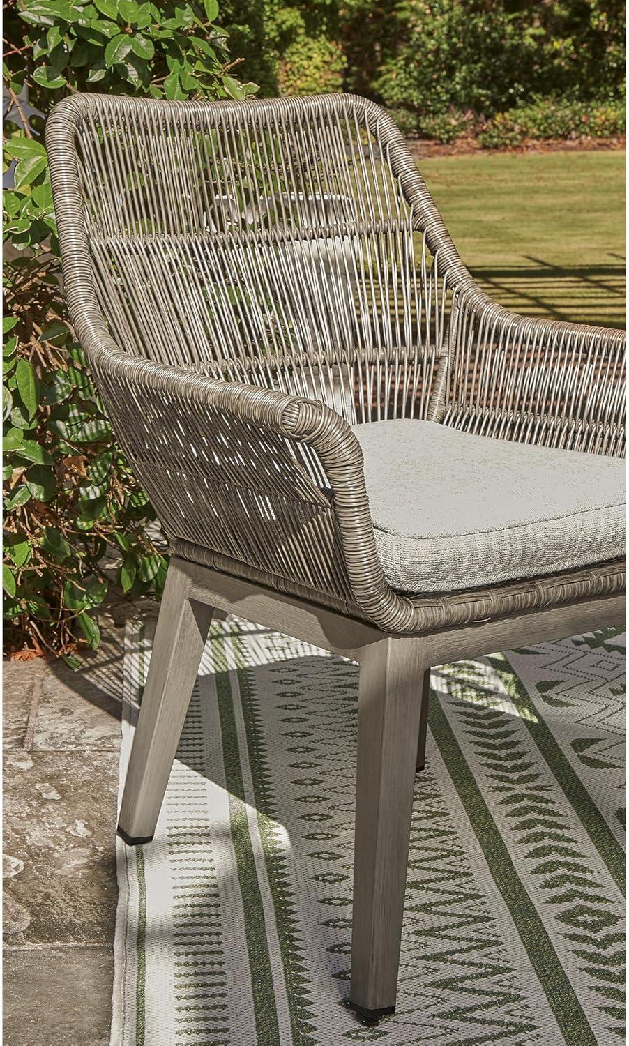 imageSignature Design by Ashley Beach Front Casual Outdoor Arm Chair with AllWeather Cushion Set of 2 Resin Wicker with Aluminum Frame 185quot Seat Height Beige