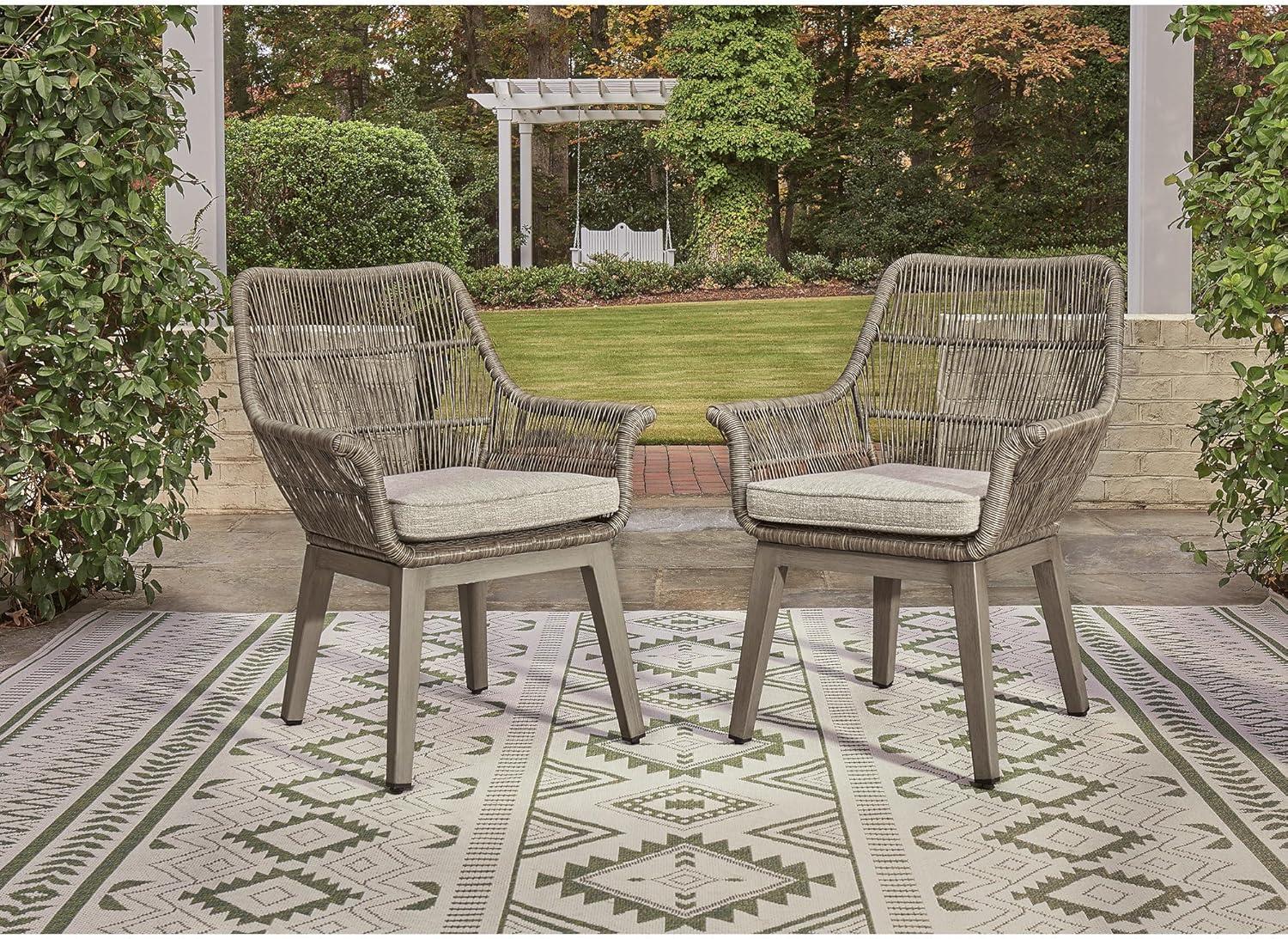 imageSignature Design by Ashley Beach Front Casual Outdoor Arm Chair with AllWeather Cushion Set of 2 Resin Wicker with Aluminum Frame 185quot Seat Height Beige