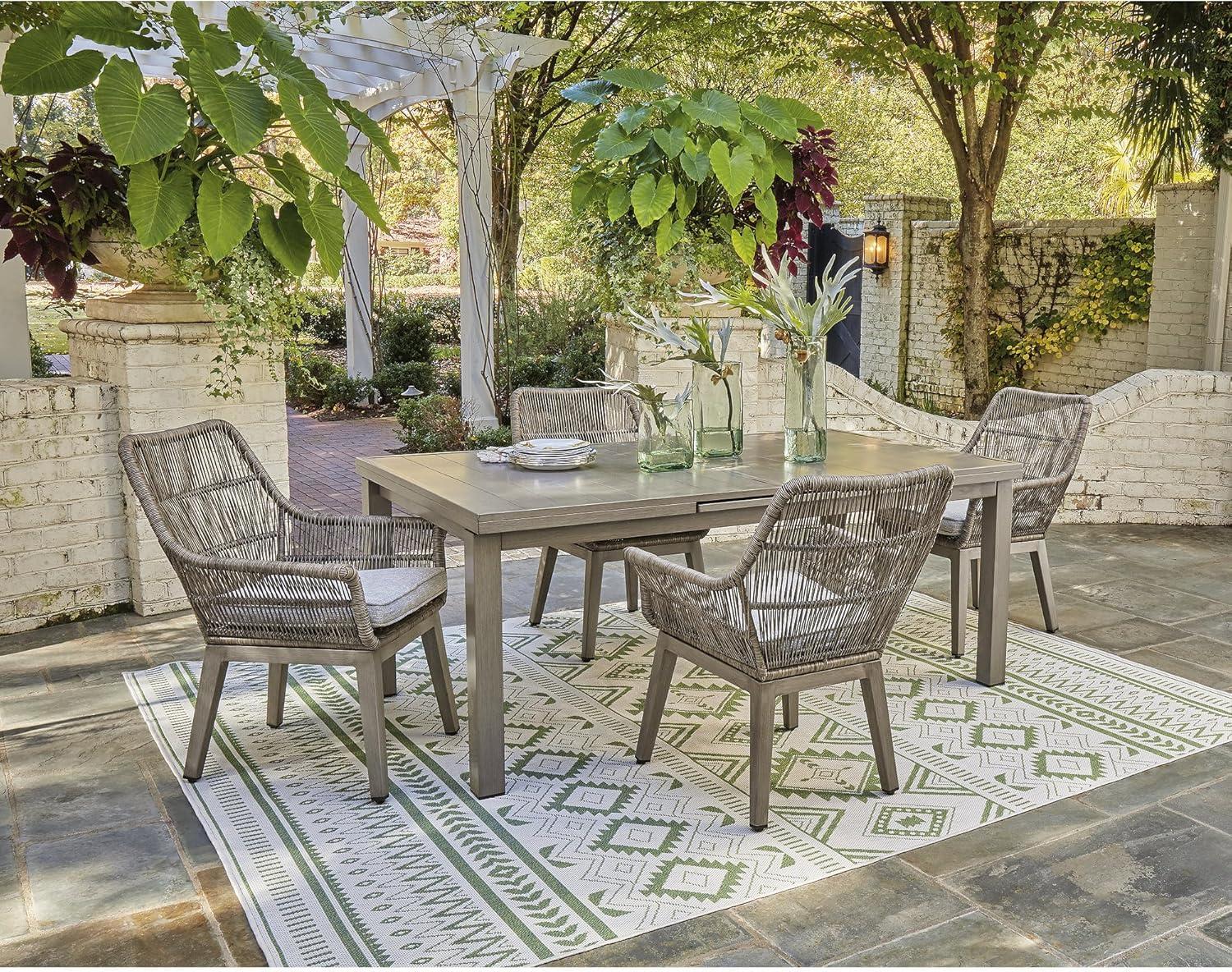 imageSignature Design by Ashley Beach Front Casual Outdoor Arm Chair with AllWeather Cushion Set of 2 Resin Wicker with Aluminum Frame 185quot Seat Height Beige