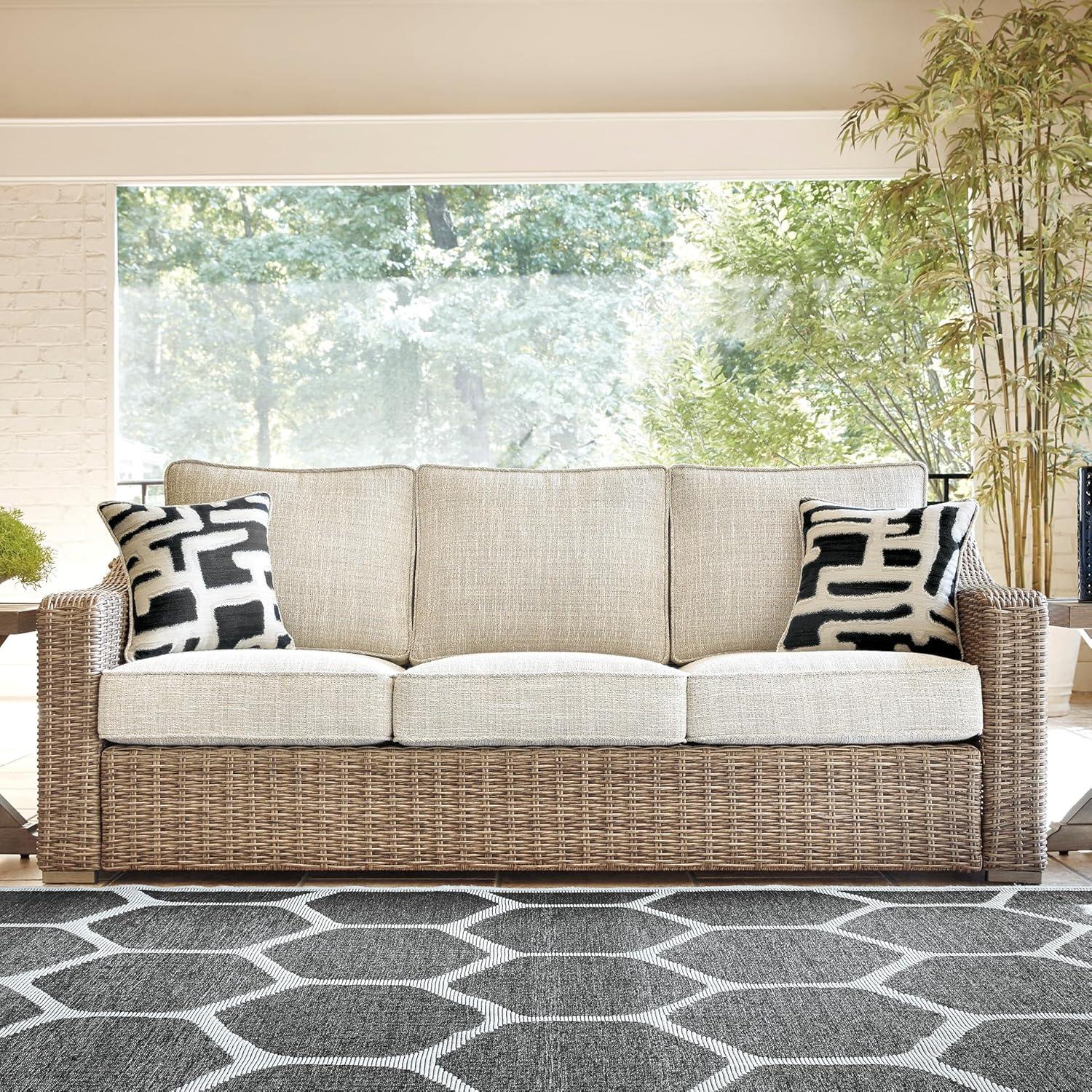 imageSignature Design by Ashley Beachcroft Casual Nuvella Weather Resistant Fabric 2Piece OutdoorIndoor Loveseat with Cushion and 4 Toss Pillows Black ampamp Light GrayBrown