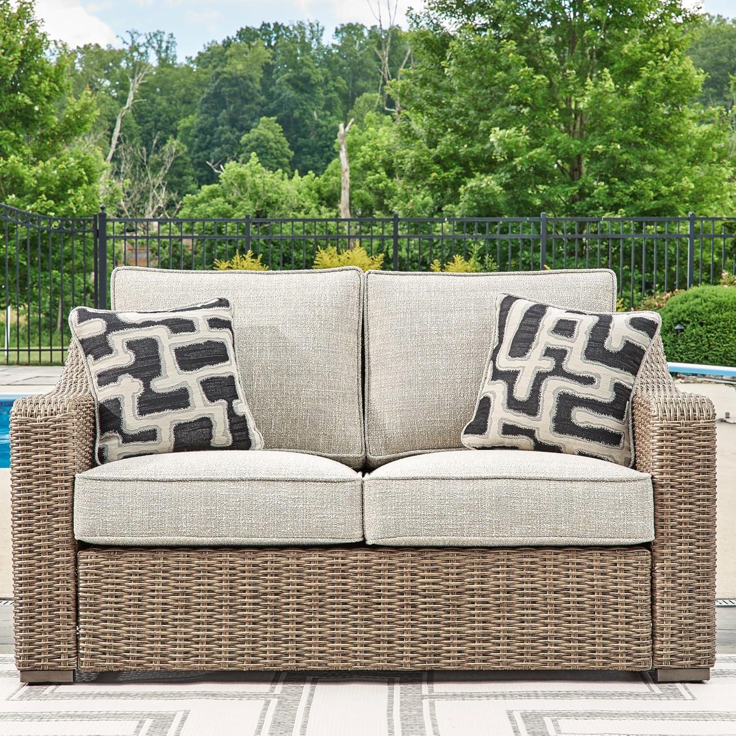 imageSignature Design by Ashley Beachcroft Casual Nuvella Weather Resistant Fabric 2Piece OutdoorIndoor Loveseat with Cushion and 4 Toss Pillows Black ampamp Light GrayGrey