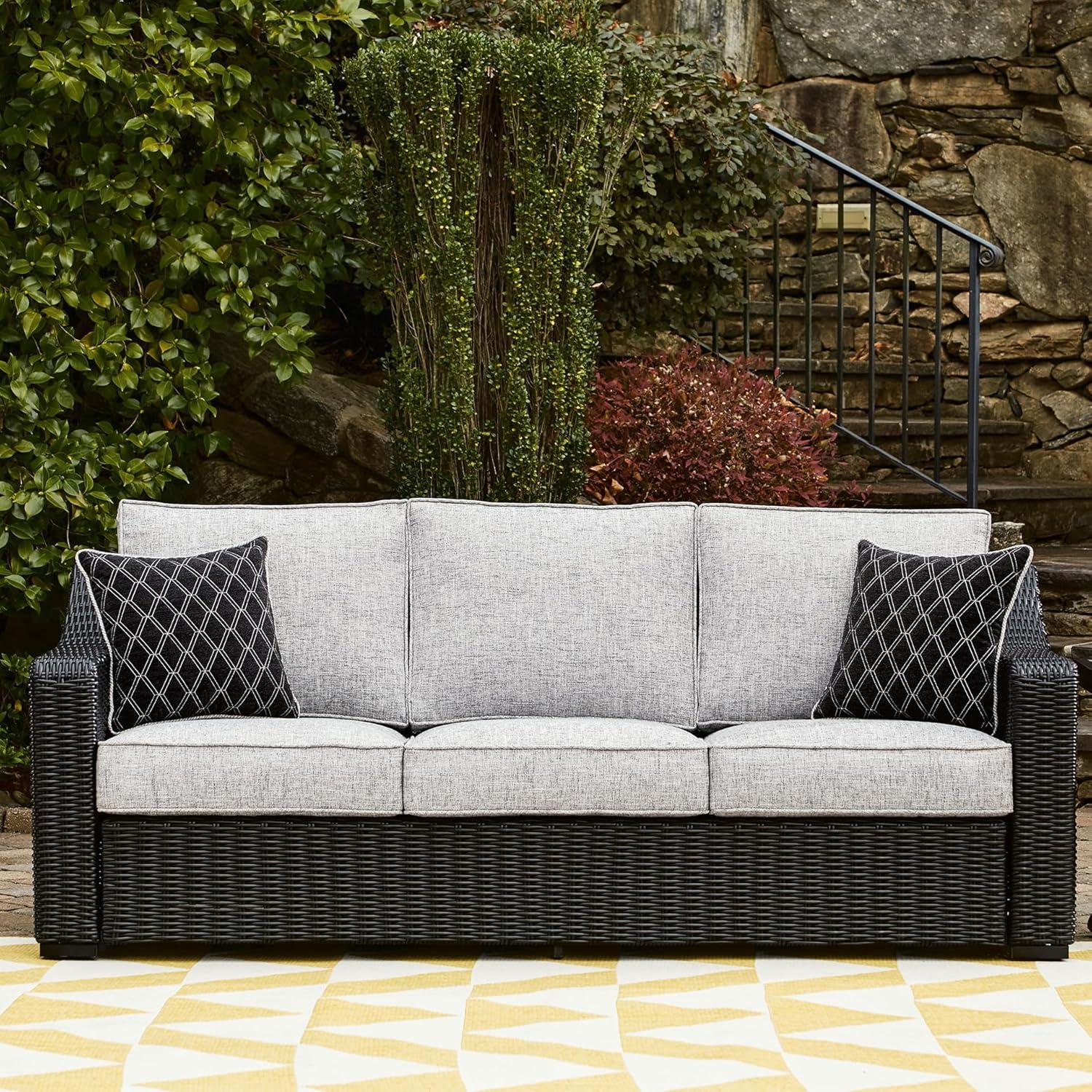 imageSignature Design by Ashley Beachcroft Casual Nuvella Weather Resistant Fabric Resin Wicker Outdoor Loveseat with Cushion and 2 Accent Pillows Dark Brown ampamp BeigeGrey