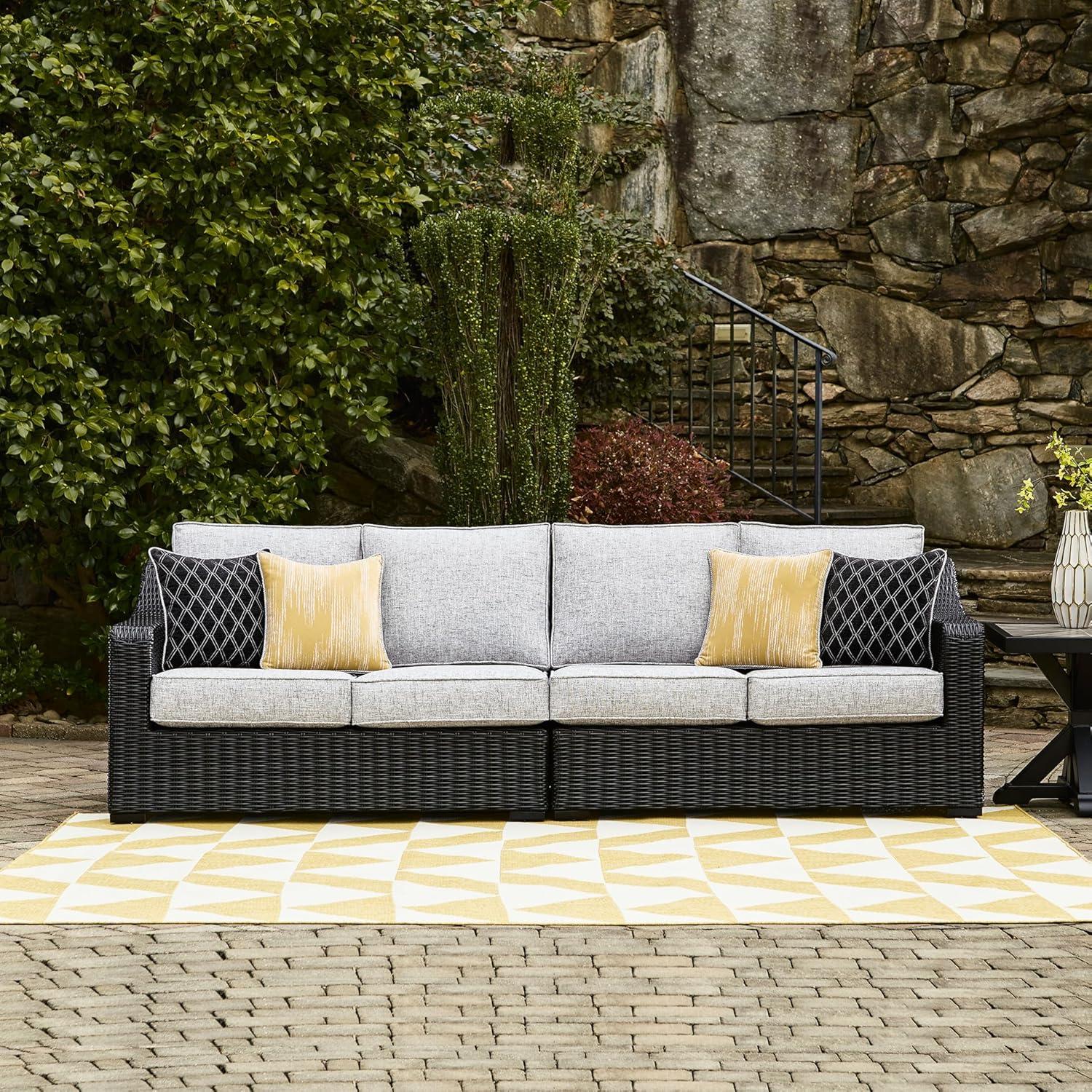 imageSignature Design by Ashley Beachcroft Casual Nuvella Weather Resistant Fabric Resin Wicker Outdoor Loveseat with Cushion and 2 Accent Pillows Dark Brown ampamp BeigeBrown