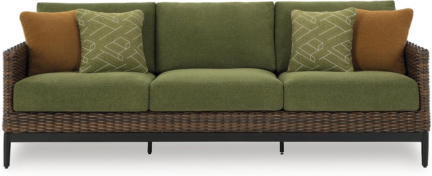 imageSignature Design by Ashley Horizon Hall Vintage Outdoor Nuvella Weather Resistant Fabric Resin Wicker Sofa with Cushion and 2 Accent Pillows Green ampamp Dark BrownOutdoor Sofa with Cushion