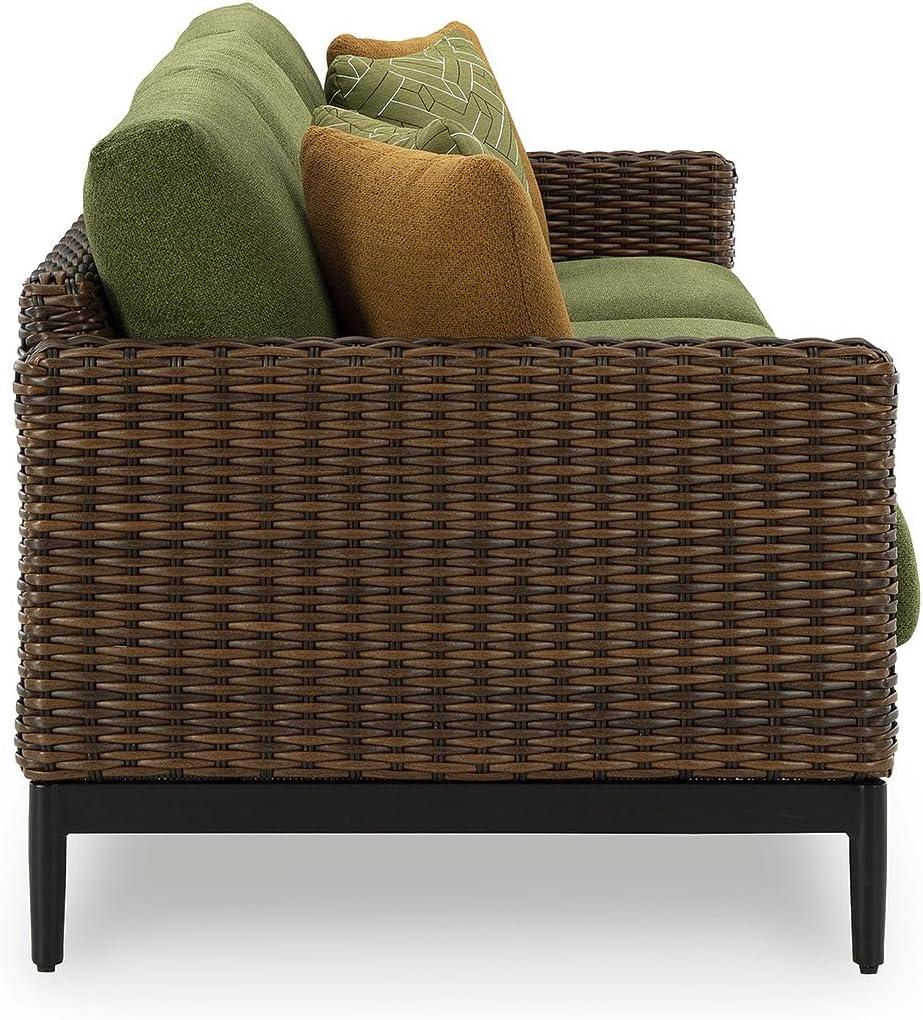 imageSignature Design by Ashley Horizon Hall Vintage Outdoor Nuvella Weather Resistant Fabric Resin Wicker Sofa with Cushion and 2 Accent Pillows Green ampamp Dark BrownOutdoor Sofa with Cushion