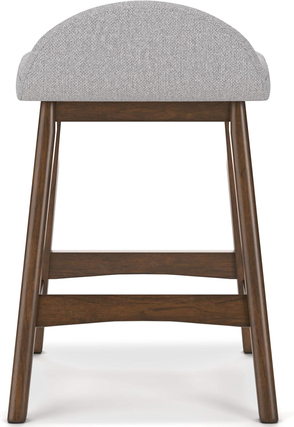 imageSignature Design by Ashley Lyncott Casual Counter Height Upholstered Bar Stool with Foam Cushion 2 Count 2425quot Seat Height Wood Frame Charcoal ampamp BrownLight Gray Brown