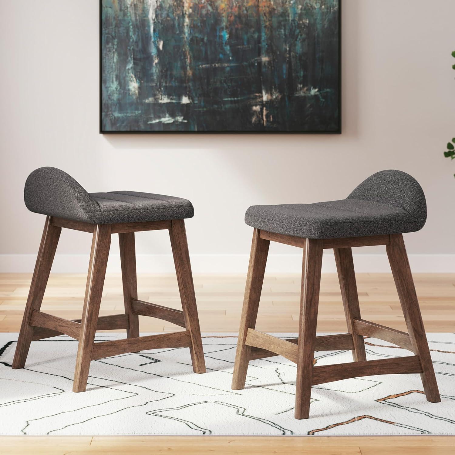 imageSignature Design by Ashley Lyncott Casual Counter Height Upholstered Bar Stool with Foam Cushion 2 Count 2425quot Seat Height Wood Frame Charcoal ampamp BrownCharcoal Brown