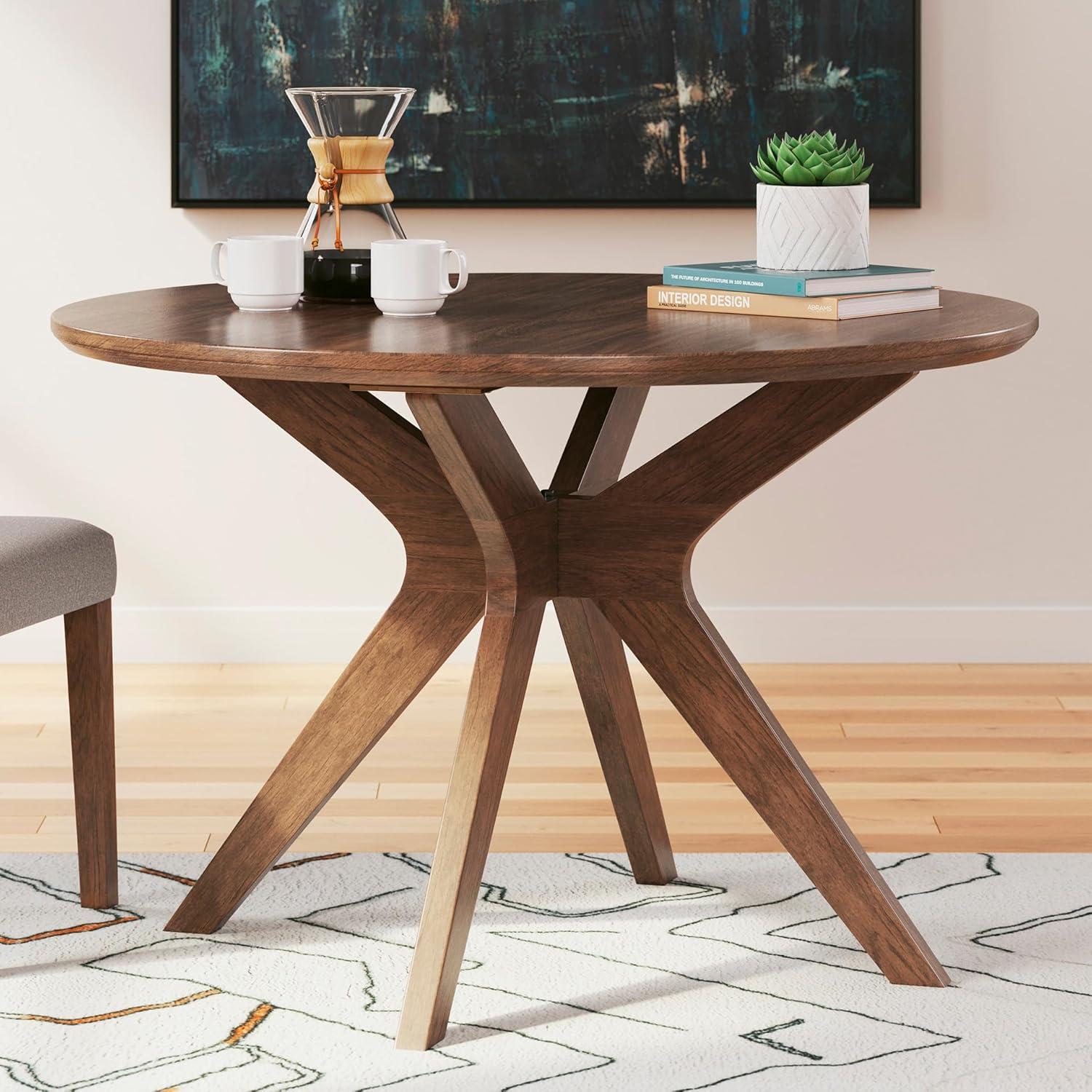 imageSignature Design by Ashley Lyncott Traditional Round Dining Room Table Seats up to 4 Brown 45quot W x 2975quot HLight Brown