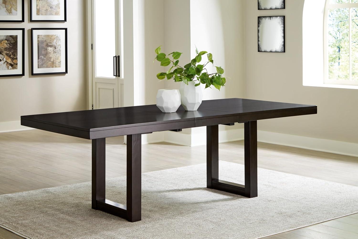 imageSignature Design by Ashley Neymorton Contemporary Dining Extension Table with Sled Base Dark Brown