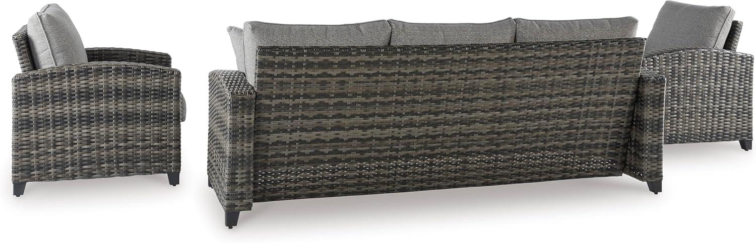 imageSignature Design by Ashley Oasis Court Casual Weather Resistant Cushioned Outdoor SofaChairsTable Set with 2 Throw Pillows Set of 4Nuvella Weather Resistant Fabric Gray