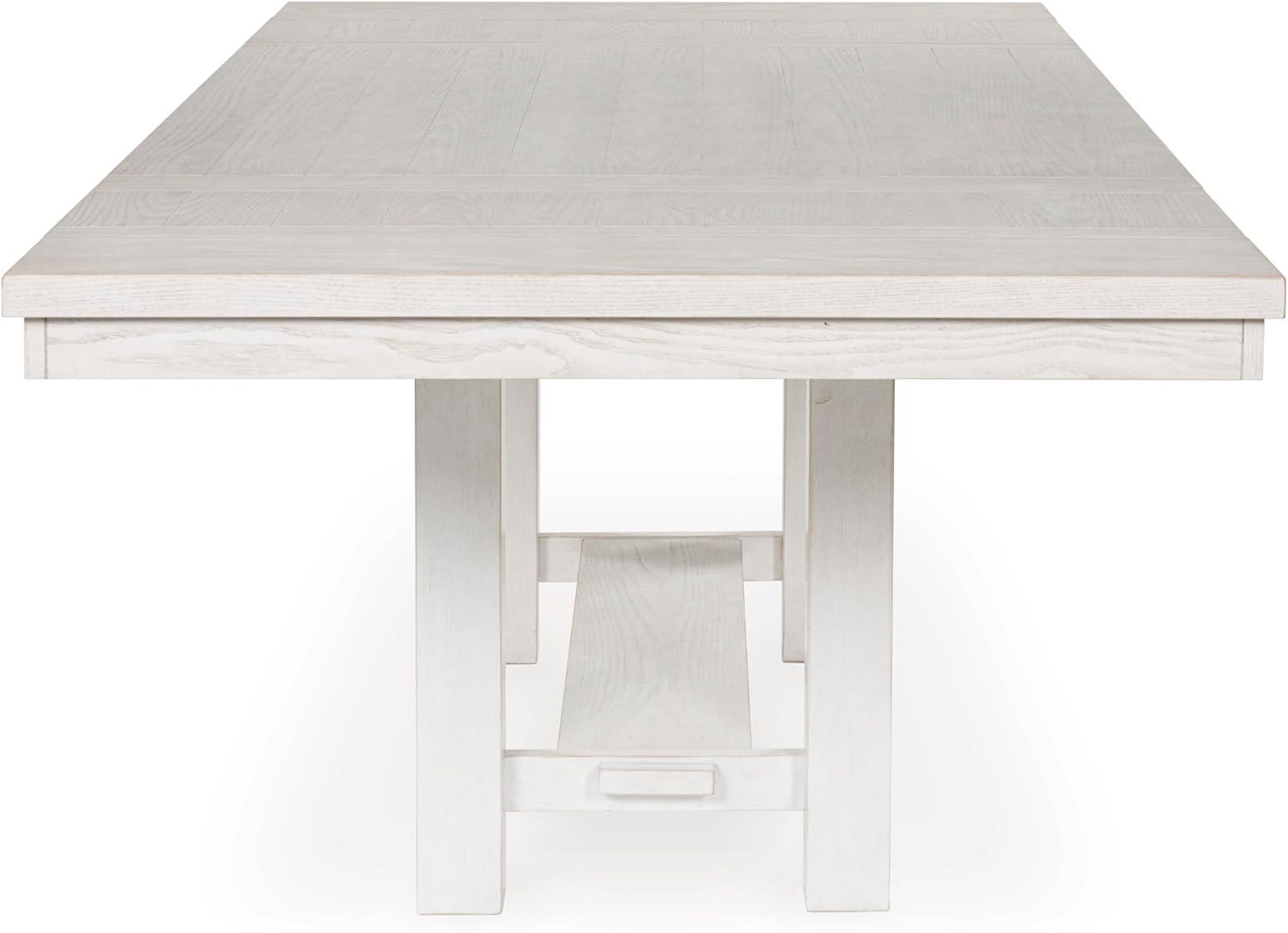 imageSignature Design by Ashley Robbinsdale Casual Removable Center Leaf Dining Extension Table with Trestle Base Wood Ash Veneer Tabletop with Planked Effect 2 Removable Center Leaves Seats 8 WhiteAntique White