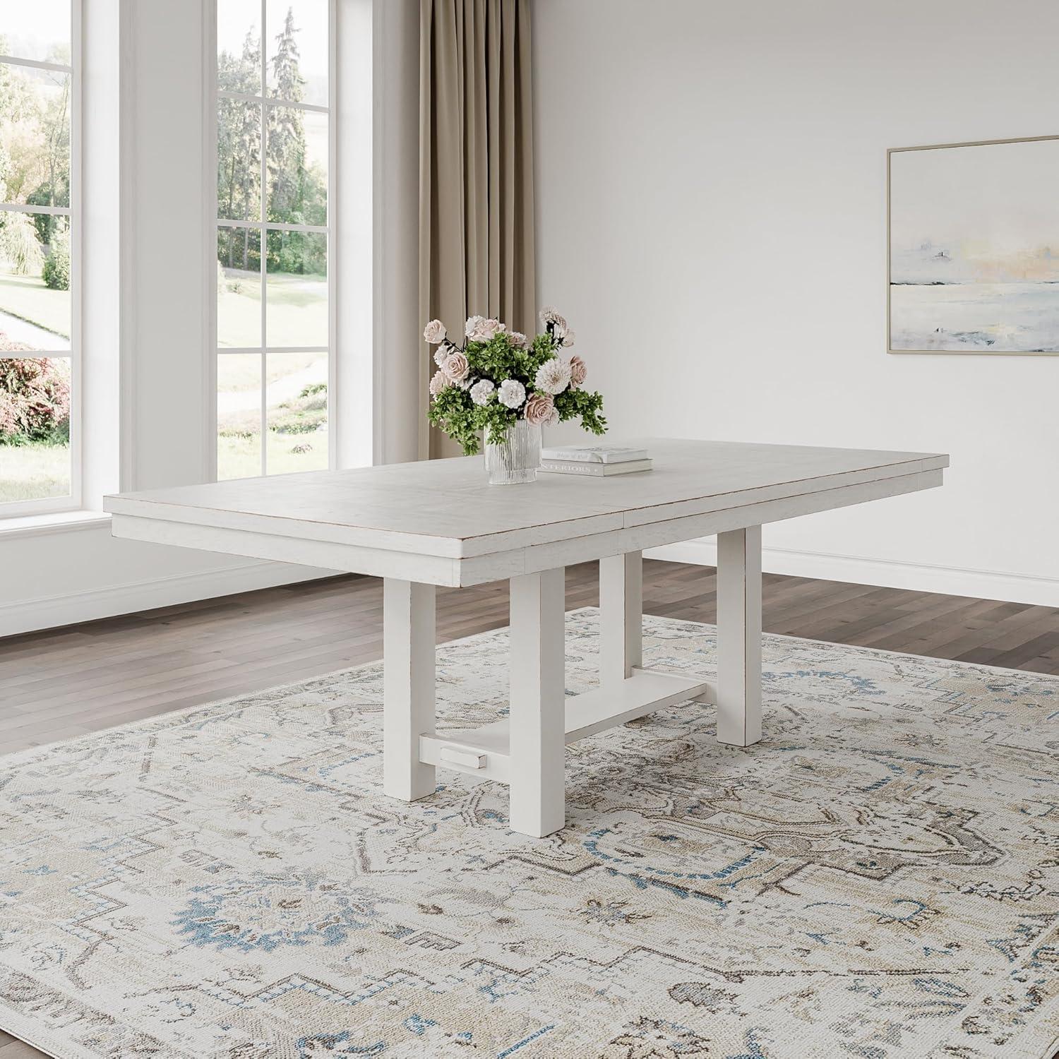 imageSignature Design by Ashley Robbinsdale Casual Removable Center Leaf Dining Extension Table with Trestle Base Wood Ash Veneer Tabletop with Planked Effect 2 Removable Center Leaves Seats 8 WhiteAntique White