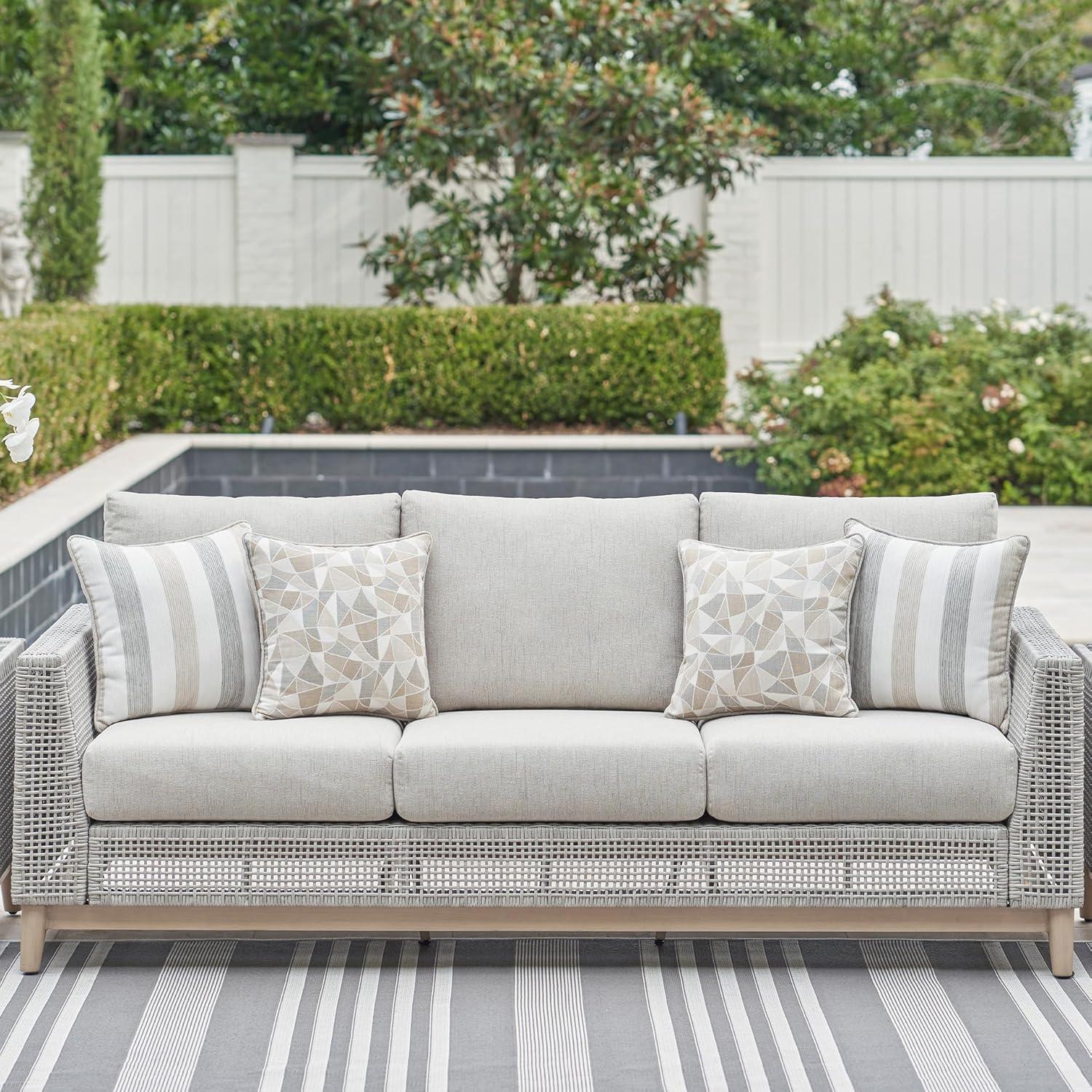 imageSignature Design by Ashley Seton Creek Cottage Nuvella Weather Resistant Fabric Outdoor Loveseat with Cushion and 2 Throw Pillows Light Brown ampamp Light GrayOutdoor Sofa with Cushion