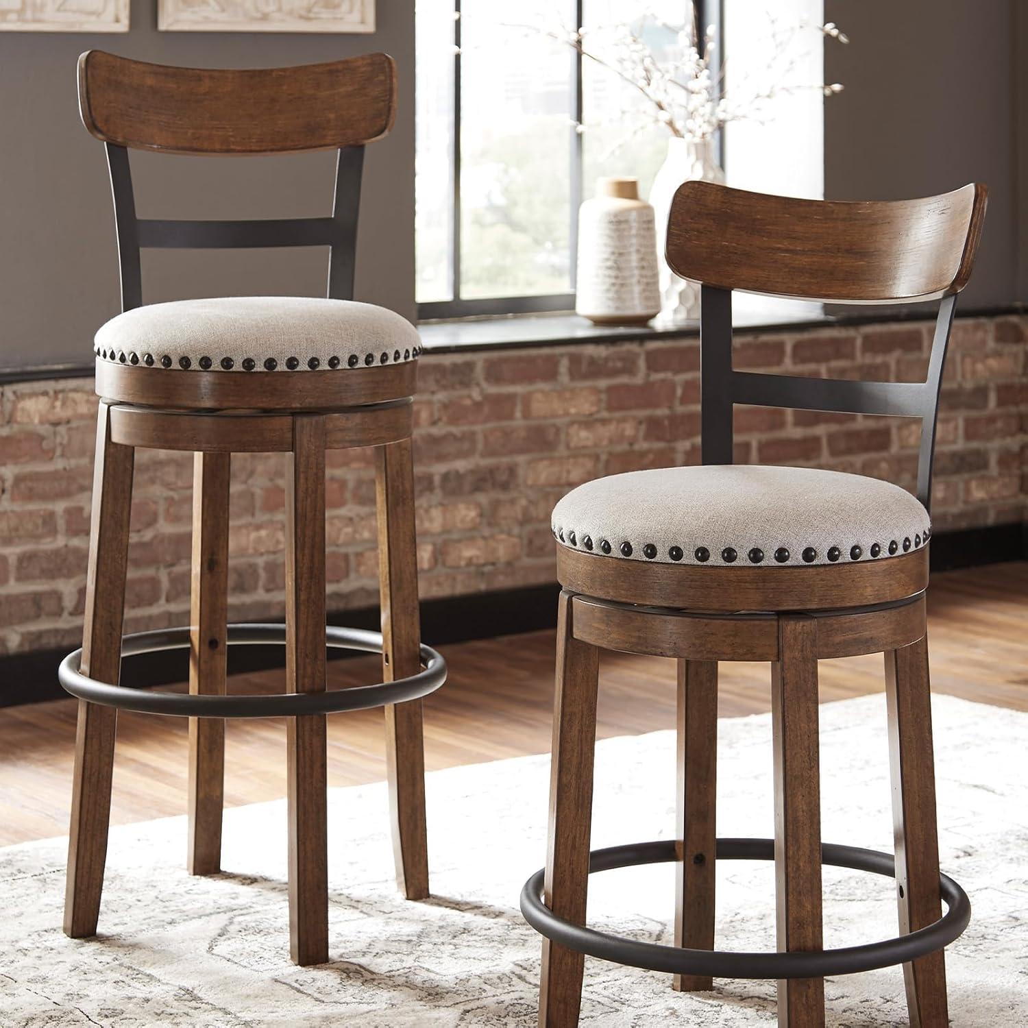 imageSignature Design by Ashley Valebeck Casual Upholstered Swivel Stool Round Metal Footrest Nailhead Trim Detail Wood 24quot White ampamp BlackDark Brown