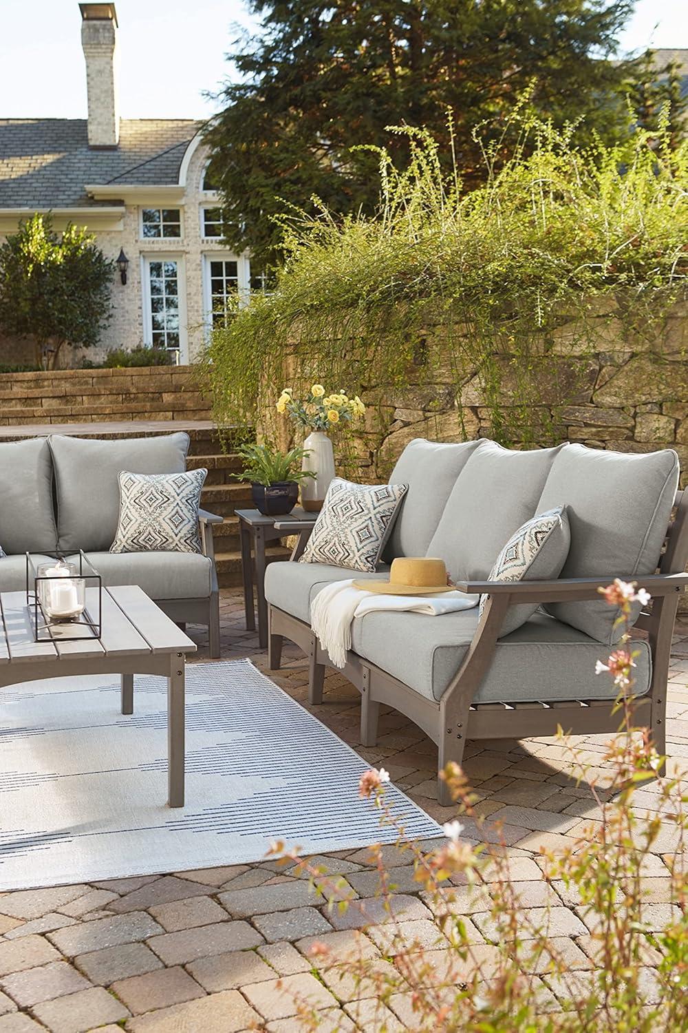 imageSignature Design by Ashley Visola Outdoor Patio Sofa with AllWeather Cushion and 2 Throw Pillows Cleanable Performance Fabric 1988quot Seat Height Gray