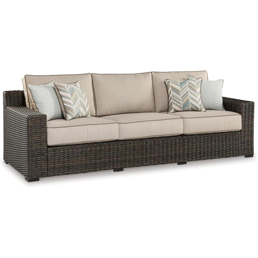 imageSignature Design by Ashley Coastline Bay Casual Outdoor Swivel Lounge with Cushion and 2 Cup Holders Nuvella Weather Resistant Fabric Beige ampamp Dark BrownOutdoor Sofa with Cushion