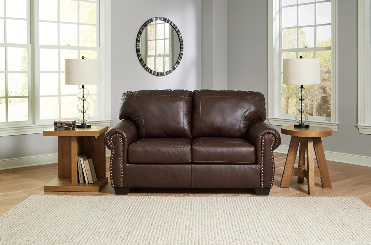imageSignature Design by Ashley Colleton Traditional Loveseat with Nailheads Top Grain Leather and Skillfully Matched Leather 67quot W x 40quot D x 39quot H Dark Brown