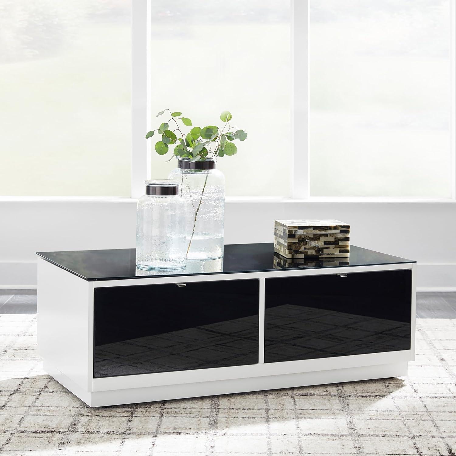 imageSignature Design by Ashley Gardoni Modern GlassTabletop Coffee Table with 2 Drawers Open Shelf Casters and High Gloss Finish White ampamp Black