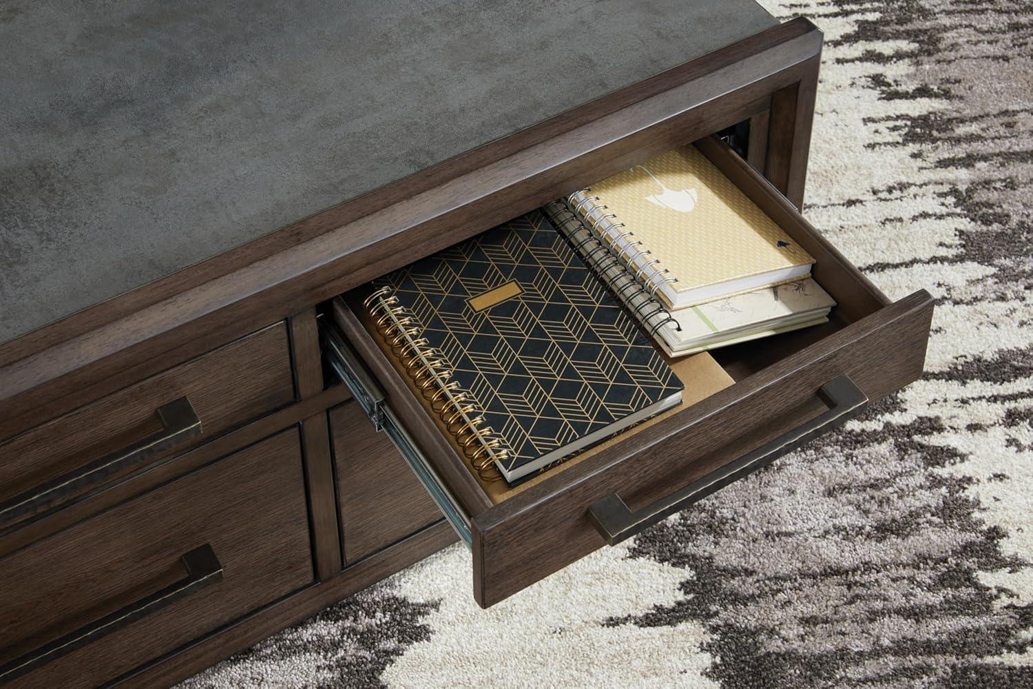 imageSignature Design by Ashley Kallenny Contemporary 8Drawer Coffee Table with Faux Cement Top and Casters Dark Brown ampamp Gray