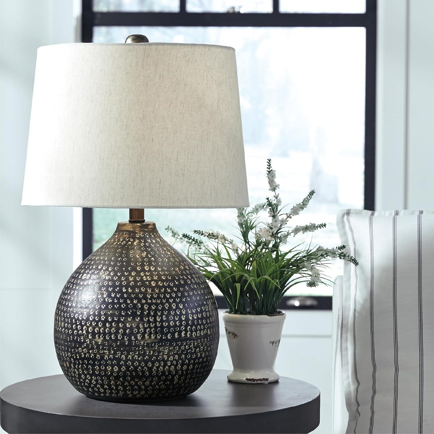 imageSignature Design by Ashley Magalie Contemporary UL Listed Table Lamp with Modified Drum Shade 3Way Switch Hammered Aluminum 2313quot High Antique SilverWhite