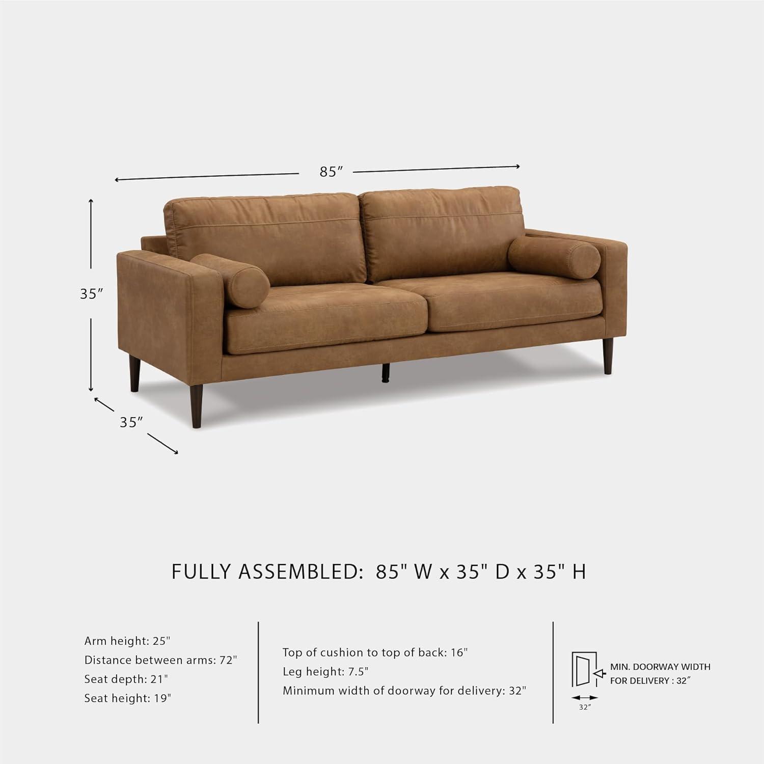 imageSignature Design by Ashley Telora Faux Leather Sofa 2 Bolster Pillows Loose Cushions Faux Wood Finish Accent Legs 85quot W x 35quot D x 35quot H Dark BrownDark Brown