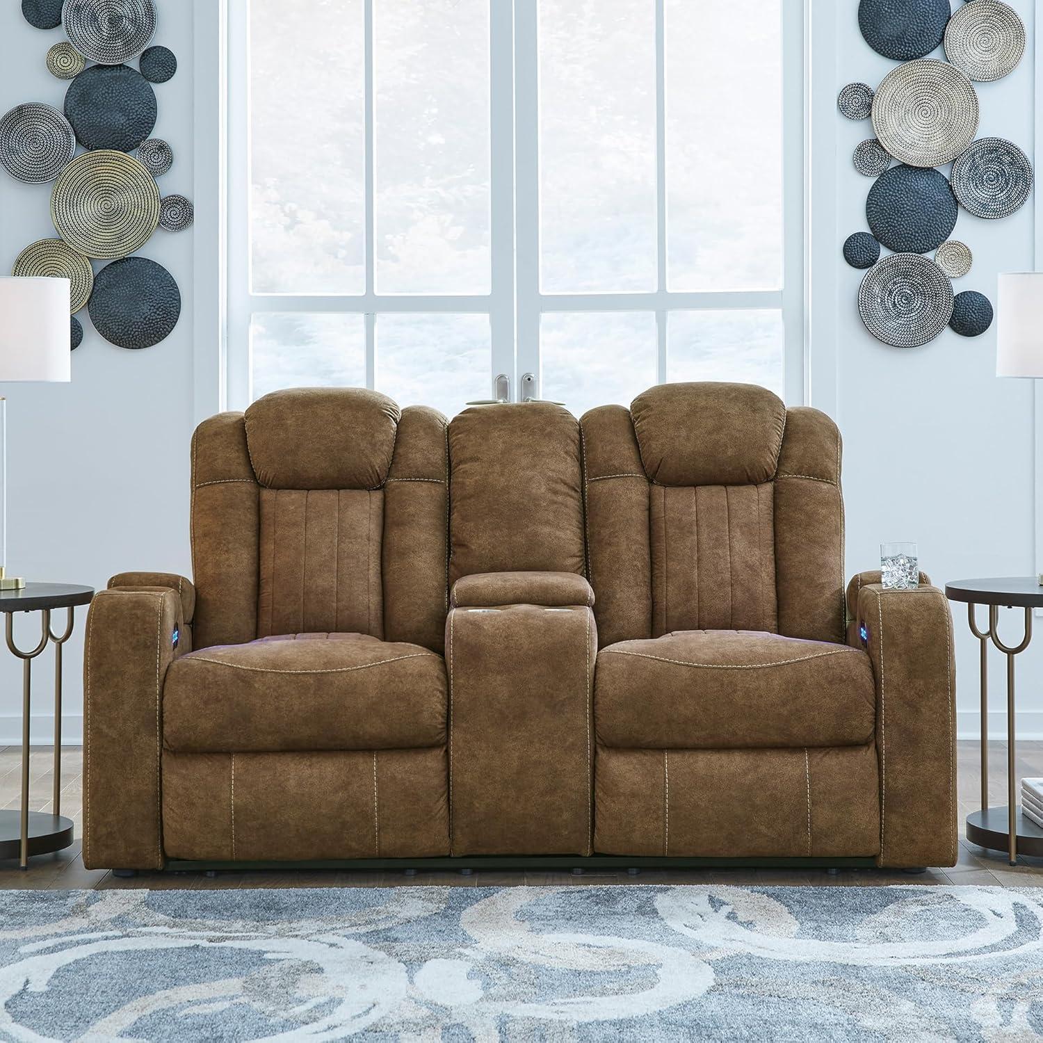 imageSignature Design by Ashley Wolfridge Contemporary Faux Leather Power Reclining Sofa with Drop Down Table LED Lights Electrical Outlet Wireless Charging USB Ports and Cup Holders Light BrownBrown