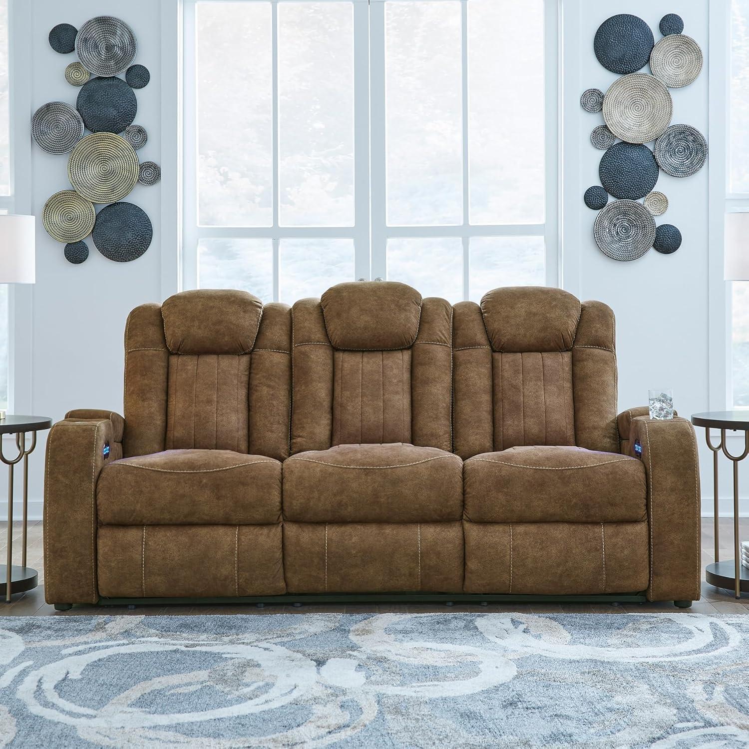 imageSignature Design by Ashley Wolfridge Contemporary Faux Leather Power Reclining Sofa with Drop Down Table LED Lights Electrical Outlet Wireless Charging USB Ports and Cup Holders Light BrownBrown