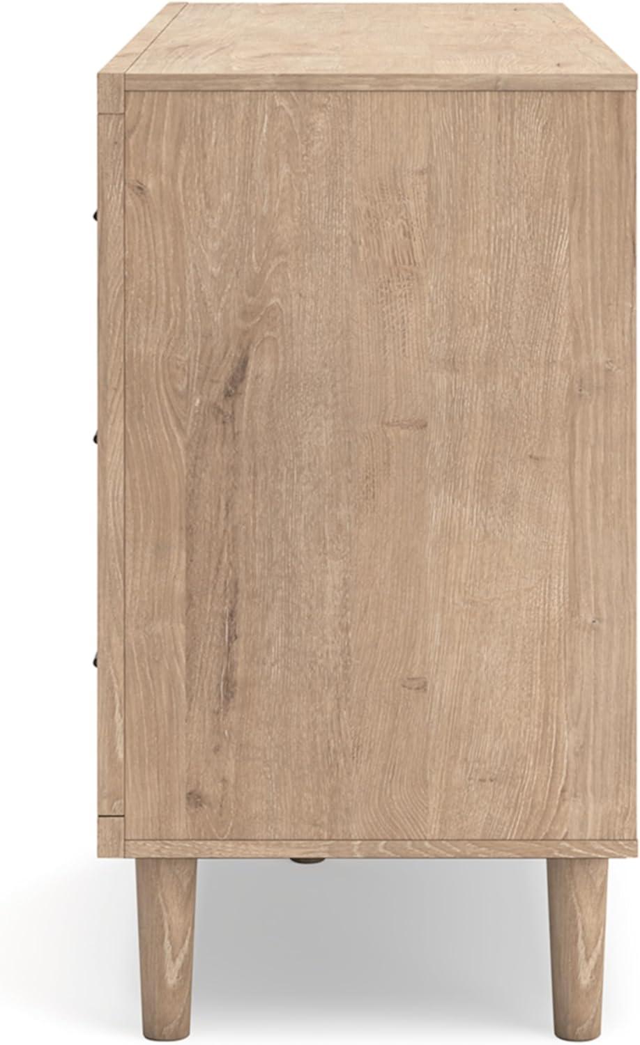 imageSignature Design by Ashley Cielden Coastal 6Drawer Dresser BronzeTone Knobs Safety Stop Textured Cane Details 6201quot W x 1965quot D x 3567quot H Light BrownLight Brown