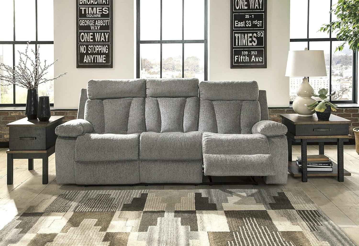 imageSignature Design by Ashley Mitchiner Contemporary Manual Reclining Sofa with Center Drop Down ampamp Cup Holders GrayReclining Sofa