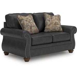 Signature Design by Ashley Chatterton Rustic Faux Leather Loveseat with Nailhead Trim and 2 Throw Pillows, Reinforced Frame for Added Stability, Reversible Seat Cushions, Turned Legs, Black(Black)