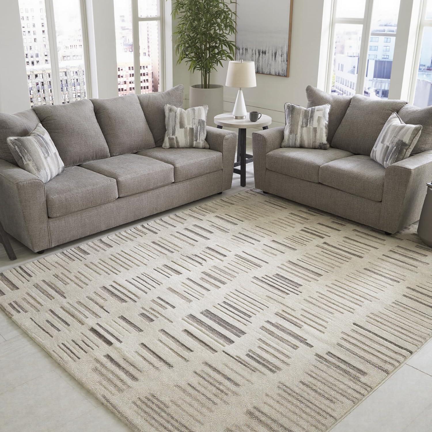 imageSignature Design by Ashley Leesdale Casual Indoor Striped Handmade 5 x 7 Rug White ampamp Light Brown78 x 101 Rectangular