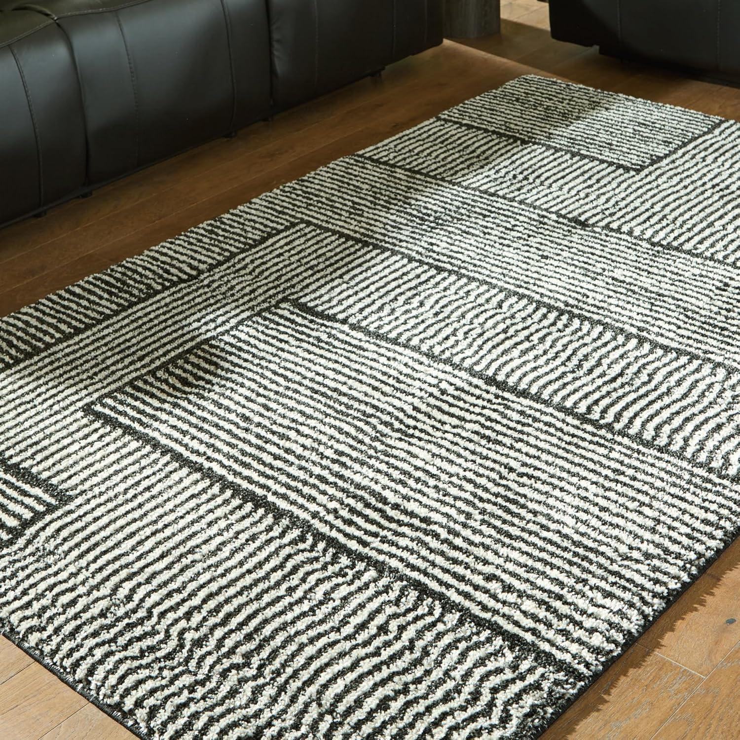 imageSignature Design by Ashley Qaabiz Bohemian 8 x 10 Indoor Medium Pile Geometric Area Rug Light Brown ampamp BlackBlackIvory