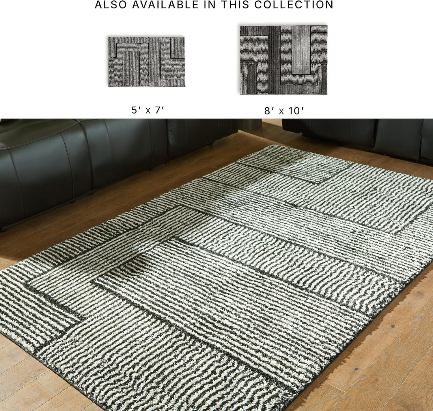 imageSignature Design by Ashley Qaabiz Bohemian 8 x 10 Indoor Medium Pile Geometric Area Rug Light Brown ampamp BlackBlackIvory