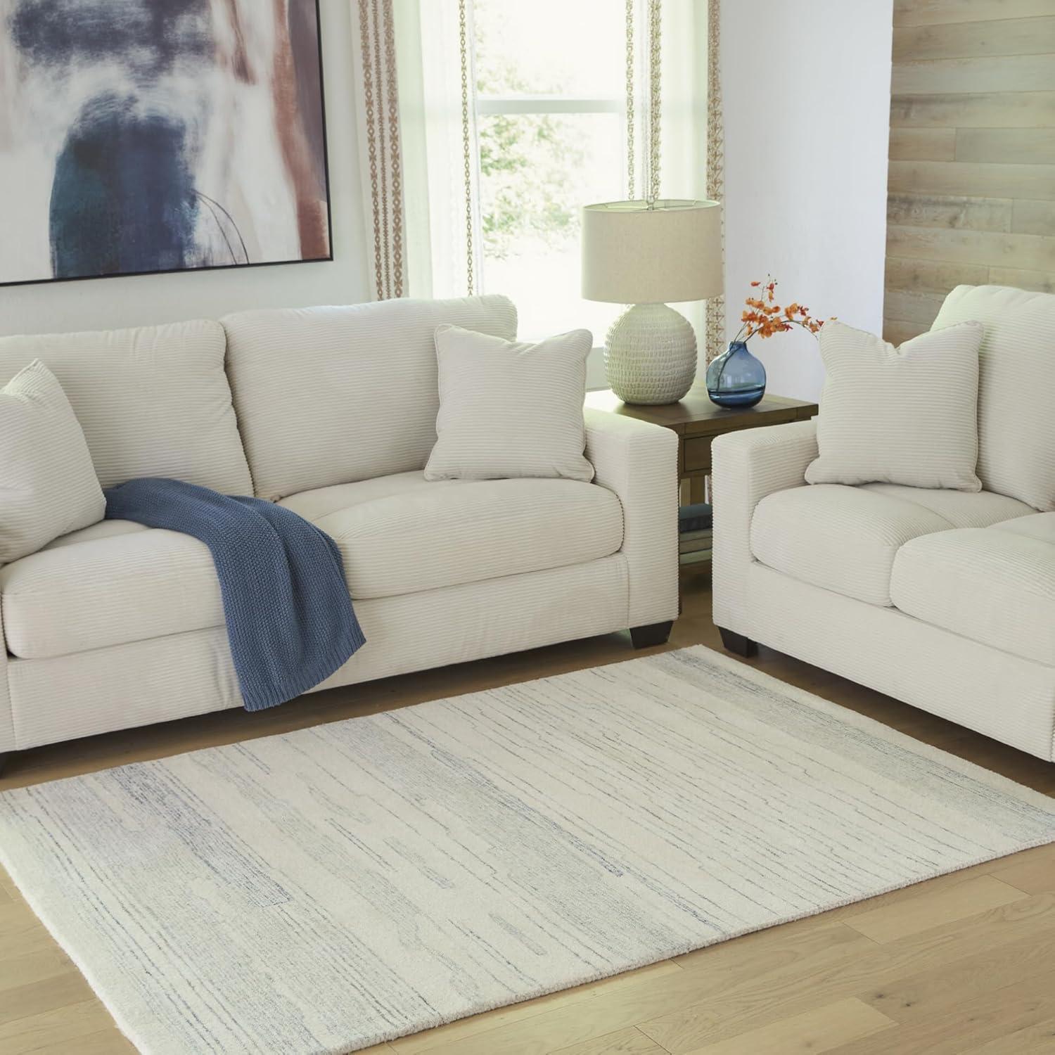 imageSignature Design by Ashley Qaabiz Bohemian 8 x 10 Indoor Medium Pile Geometric Area Rug Light Brown ampamp BlackIvoryBlue