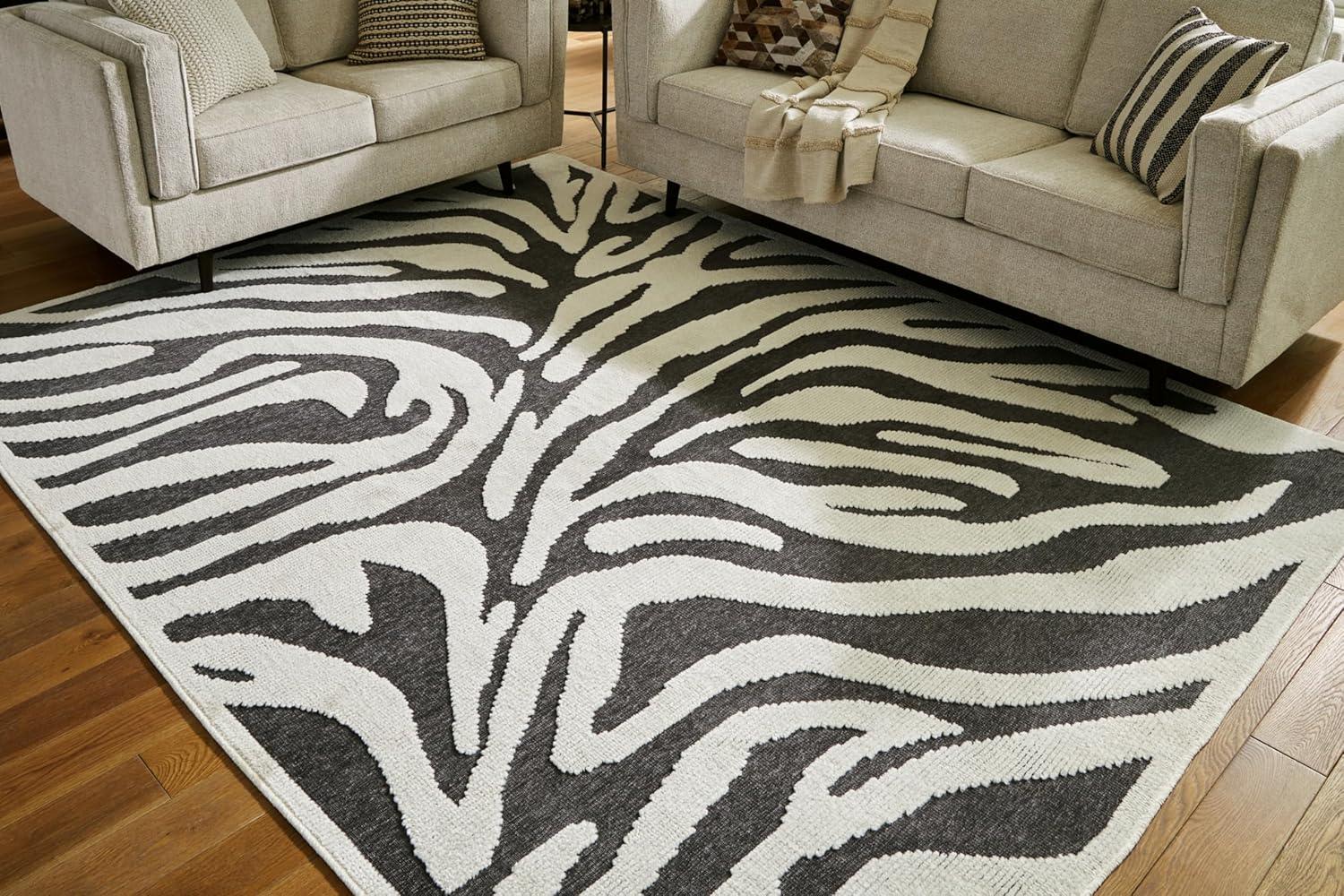 imageSignature Design by Ashley Thomwith Contemporary Indoor Washable Zebra Design 8 x 10 Rug with Non Slip Backing Black ampamp White710 x 101 Rectangular