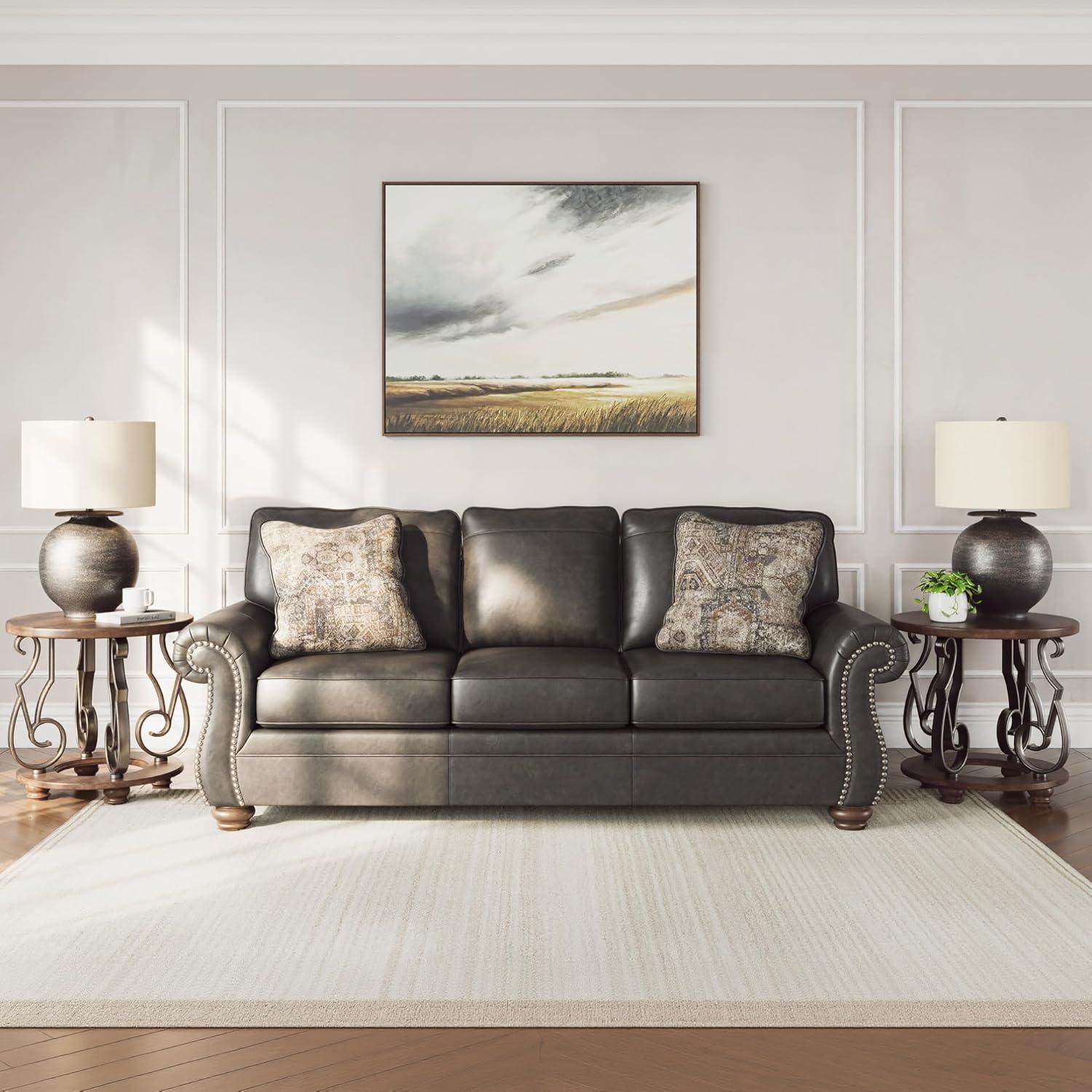 imageSignature Design by Ashley Chatterton Rustic Faux Leather Queen Sofa Sleeper with BiFold Memory Foam Mattress Nailhead Trim and 2 Throw Pillows Queen BlackGrey