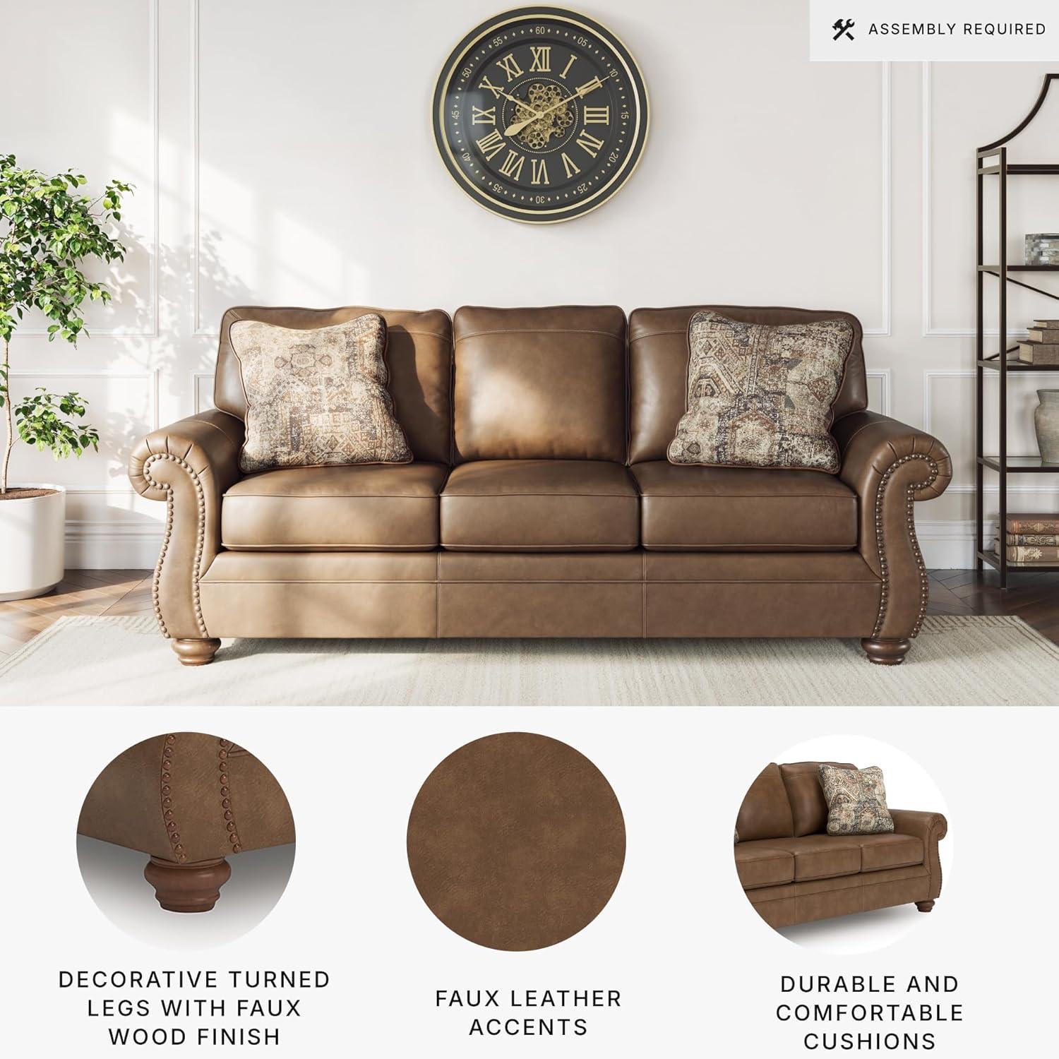 imageSignature Design by Ashley Shadsburne Rustic Faux Leather Sofa Sleeper with BiFold Memory Foam Mattress Nailhead Trim and 2 Throw Pillows Queen BrownBrown