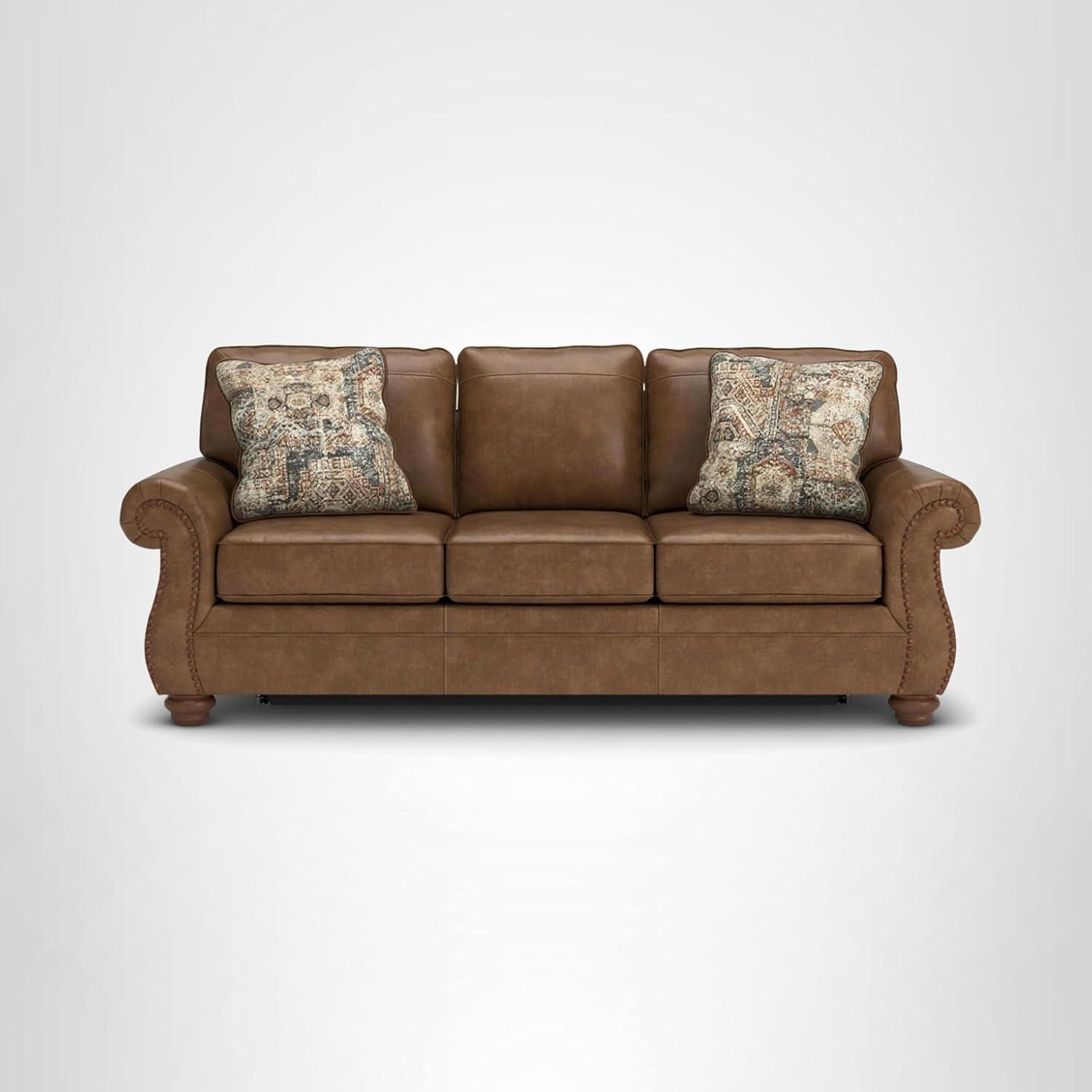 imageSignature Design by Ashley Shadsburne Rustic Faux Leather Sofa Sleeper with BiFold Memory Foam Mattress Nailhead Trim and 2 Throw Pillows Queen BrownBrown