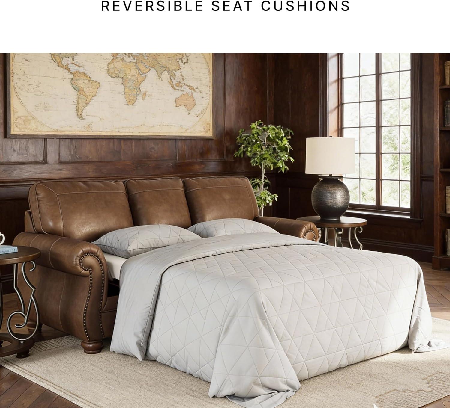imageSignature Design by Ashley Shadsburne Rustic Faux Leather Sofa Sleeper with BiFold Memory Foam Mattress Nailhead Trim and 2 Throw Pillows Queen BrownBrown