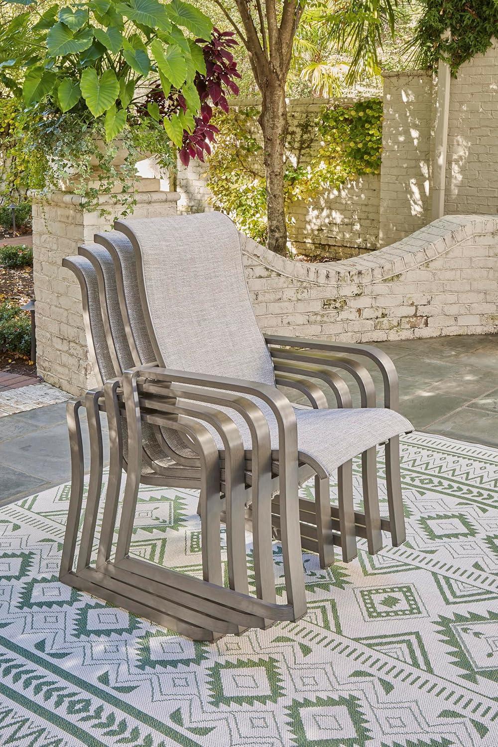 imageSignature Design by Ashley Beach Front Casual Outdoor Stackable Faux Leather Sling Arm Chair Set of 4 Light Brown4 Count Sling Chairs
