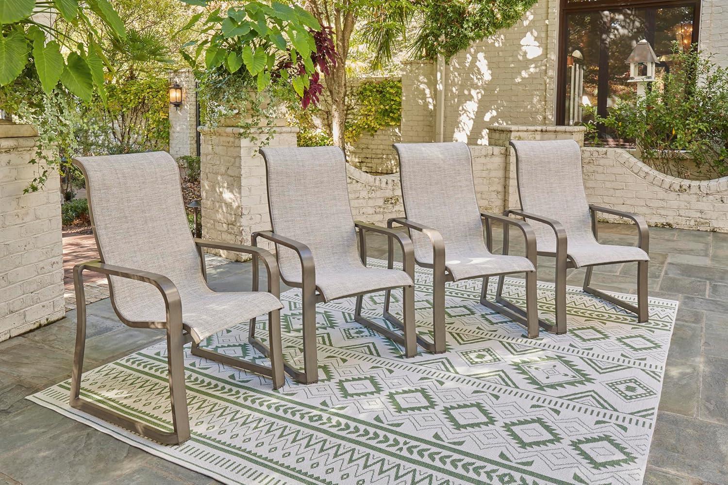 imageSignature Design by Ashley Beach Front Casual Outdoor Stackable Faux Leather Sling Arm Chair Set of 4 Light Brown4 Count Sling Chairs