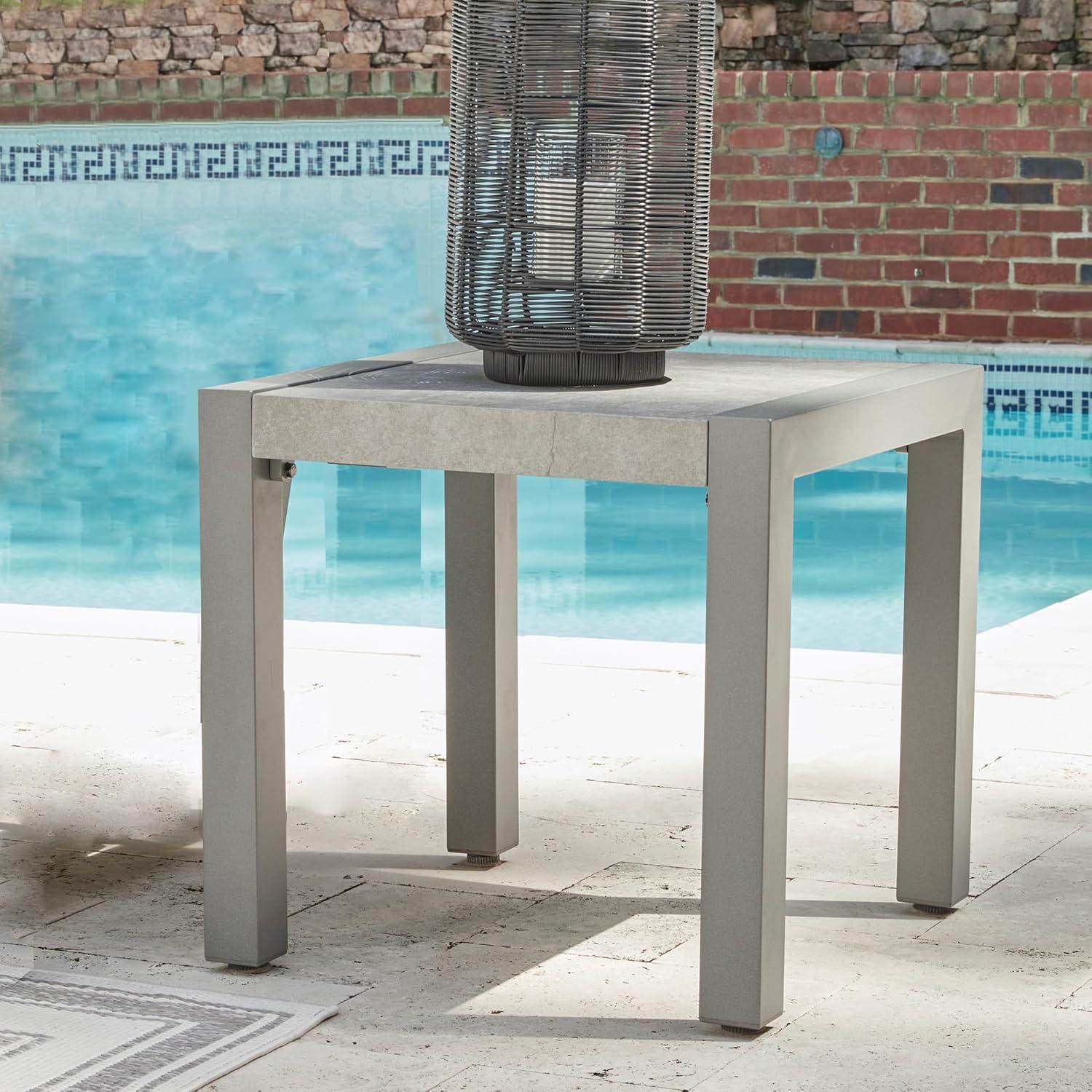 imageSignature Design by Ashley Moonlight View Contemporary Outdoor Fade and Rust Resistant Coffee Table with Stone Tabletop Light GrayOutdoor End Table