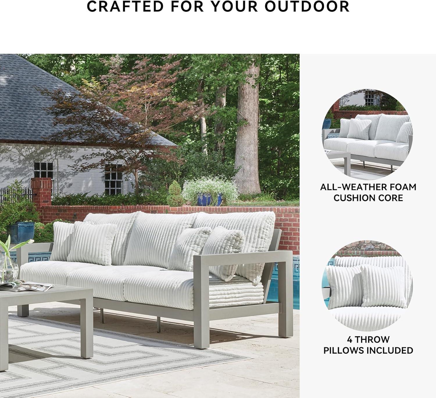 imageSignature Design by Ashley Moonlight View Contemporary Outdoor Fade and Rust Resistant Coffee Table with Stone Tabletop Light GrayOutdoor Sofa with Cushion