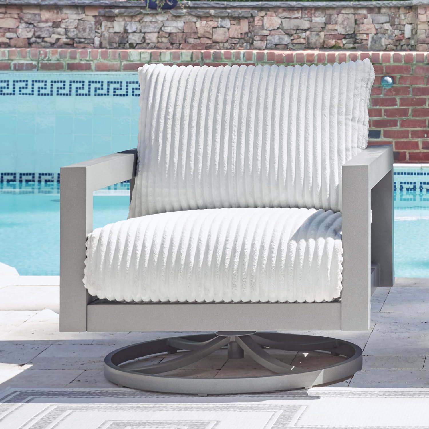 imageSignature Design by Ashley Moonlight View Contemporary Outdoor Fade and Rust Resistant Coffee Table with Stone Tabletop Light GrayOutdoor Swivel Chair with Cushion
