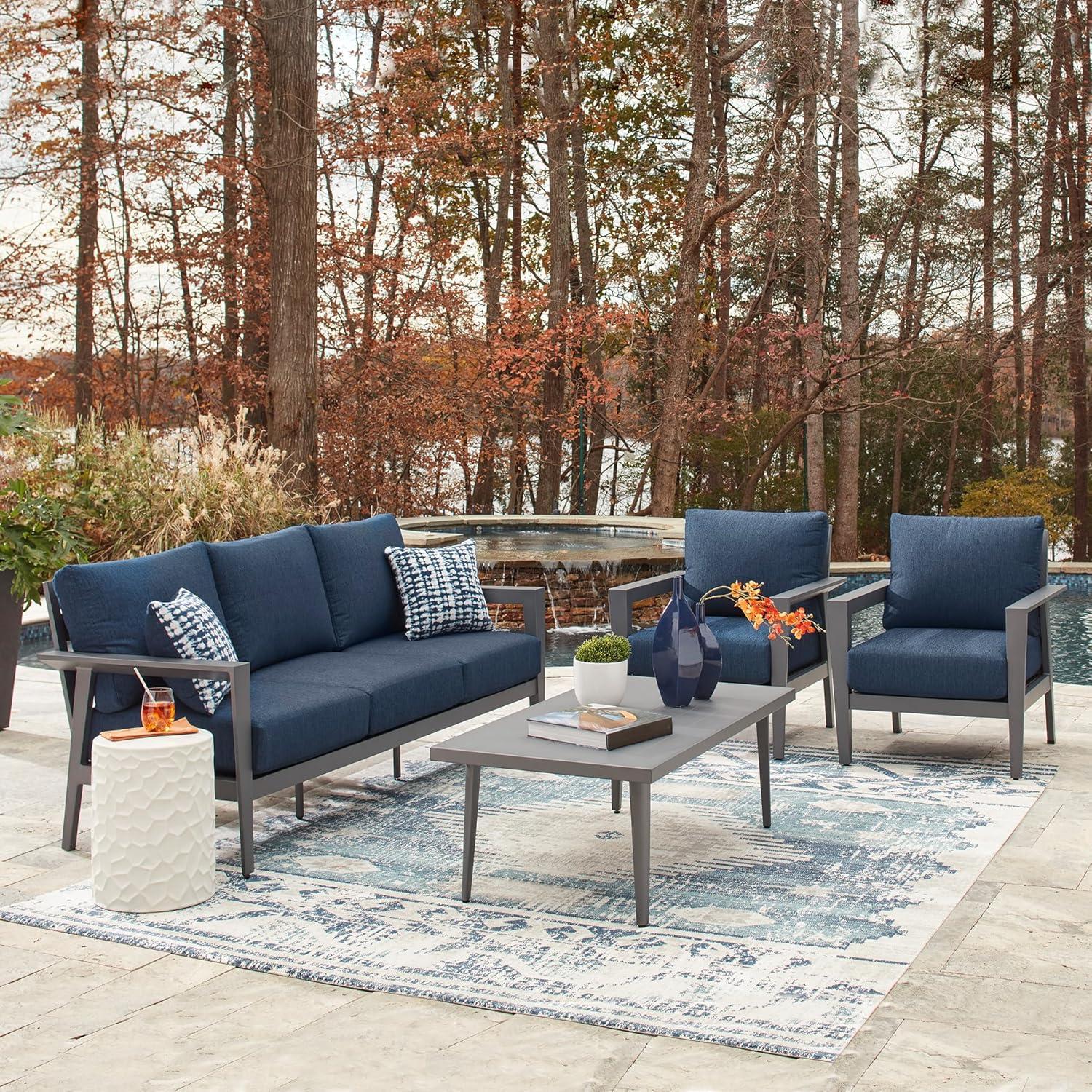 imageSignature Design by Ashley Gali Casual Nuvella Weather Resistant Fabric Outdoor SofaChairsTable Set with Cushion and Throw Pillows Set of 4 Blue amp Light Gray