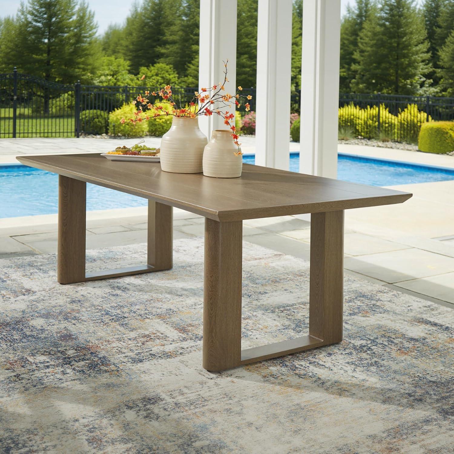 imageSignature Design by Ashley Serene Bay Casual Outdoor Dining Table with Sled Base Dark BrownOutdoor Dining Table