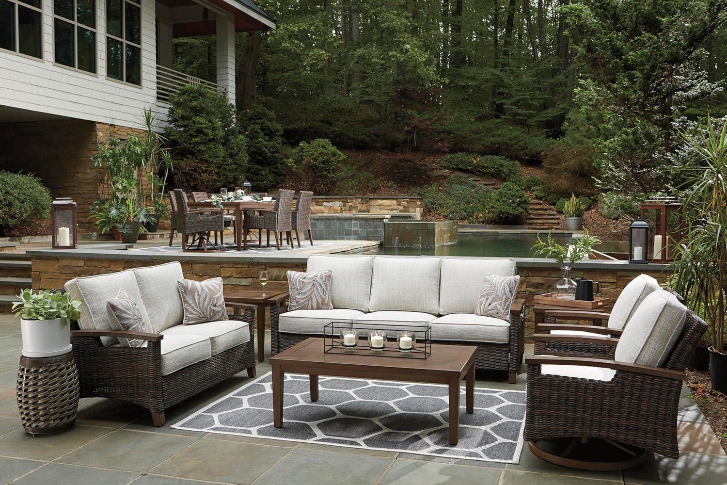 imageSignature Design by Ashley Paradise Trail Outdoor Loveseat with All Weather Cushions Nuvella Weather Resistant Fabric Medium BrownDark Brown