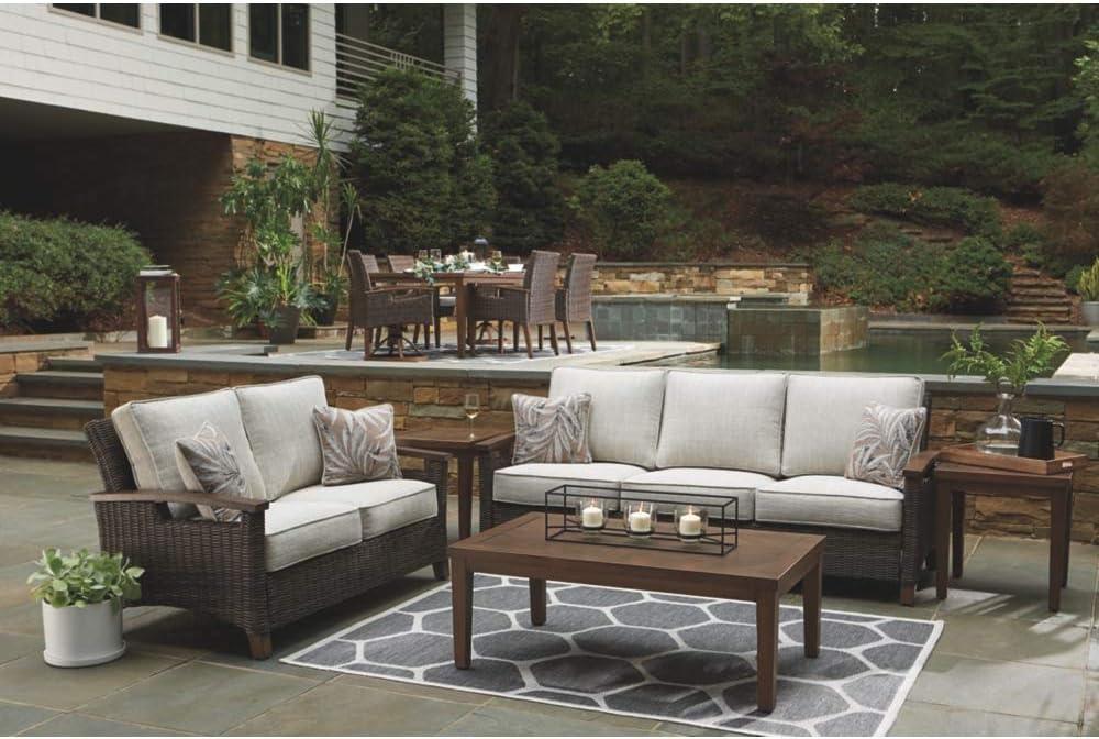 imageSignature Design by Ashley Paradise Trail Outdoor Loveseat with All Weather Cushions Nuvella Weather Resistant Fabric Medium BrownDark Brown