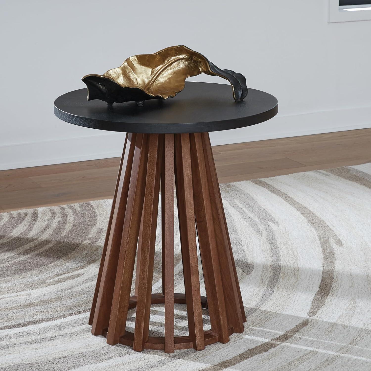 imageSignature Design by Ashley Kallari Casual Round End Table Modern Design TwoTone Slatted Base Mango Wood 2363 W x 2363 D x 25 H BrownBlackEnd Table
