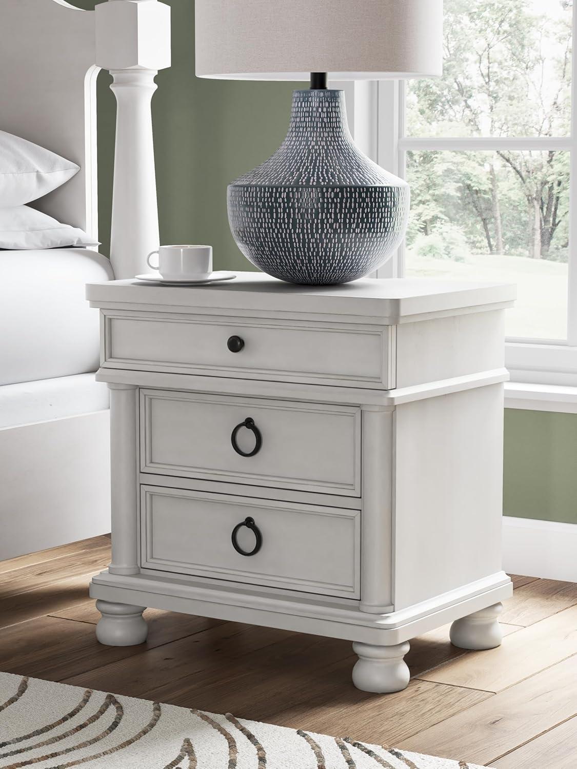imageSignature Design by Ashley Chadworth Traditional Nightstand with 3 Drawers USBA and USBC Charging Wood 27 W x 1813 D x 2738 H Antiqued WhiteAntique White